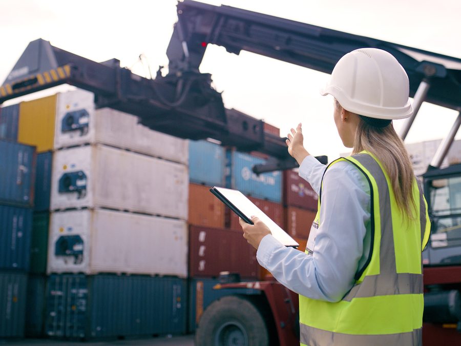 Container handler moving shipping containers